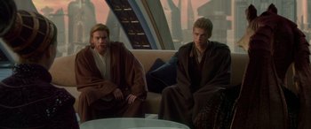Movie still from “Star Wars: Episode II - Attack of the Clones” (2002), directed by George Lucas – A couple of men sitting on top of a couch; Medium shot, Over the shoulder angle