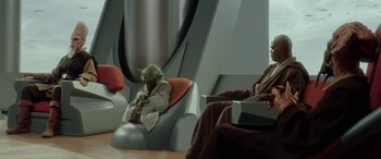 Movie still from “Star Wars: Episode II - Attack of the Clones” (2002), directed by George Lucas – Two people sitting in a room next to each other; Wide shot, High angle