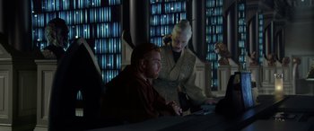 Movie still from “Star Wars: Episode II - Attack of the Clones” (2002), directed by George Lucas – A man and a woman sitting in front of a computer screen; Medium shot, Over the shoulder angle