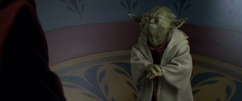 Movie still from “Star Wars: Episode II - Attack of the Clones” (2002), directed by George Lucas – A star wars character in a room; Medium shot, Low angle