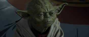 Movie still from “Star Wars: Episode II - Attack of the Clones” (2002), directed by George Lucas – A person wearing a yoda mask; Close Up shot, Low angle