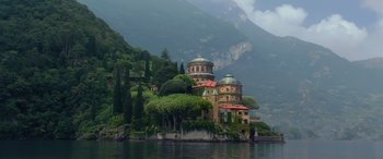 Movie still from “Star Wars: Episode II - Attack of the Clones” (2002), directed by George Lucas – A large building on top of an island in a body of water; Extreme Wide shot, Low angle