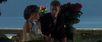 Movie still from “Star Wars: Episode II - Attack of the Clones” (2002), directed by George Lucas – A man and a woman sitting next to each other; Medium shot, Over the shoulder angle