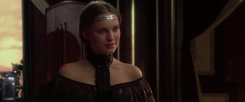 Movie still from “Star Wars: Episode II - Attack of the Clones” (2002), directed by George Lucas – A beautiful young lady wearing a black dress; Close Up shot, Over the shoulder angle