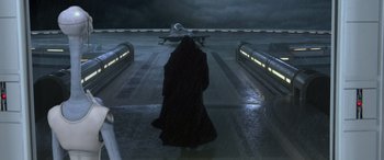 Movie still from “Star Wars: Episode II - Attack of the Clones” (2002), directed by George Lucas – A woman in a black robe walking down a ramp; Wide shot, High angle