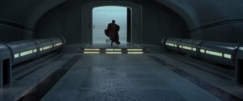 Movie still from “Star Wars: Episode II - Attack of the Clones” (2002), directed by George Lucas – A man walking down a ramp in a tunnel; Extreme Wide shot, High angle