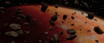 Movie still from “Star Wars: Episode II - Attack of the Clones” (2002), directed by George Lucas – An image of an asteroid field in the space; Extreme Wide shot, High angle