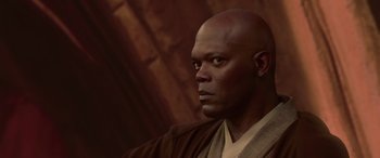 Movie still from “Star Wars: Episode II - Attack of the Clones” (2002), directed by George Lucas – A man with a bald head wearing a brown robe; Close Up shot, Over the shoulder angle