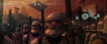 Movie still from “Star Wars: Episode II - Attack of the Clones” (2002), directed by George Lucas – A group of star wars characters in front of an orange sky; Wide shot, High angle