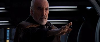 Movie still from “Star Wars: Episode III - Revenge of the Sith” (2005), directed by George Lucas – An older man with white hair and a long beard; Close Up shot, Over the shoulder angle