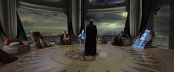 Movie still from “Star Wars: Episode III - Revenge of the Sith” (2005), directed by George Lucas – A group of people sitting in a room; Extreme Wide shot, High angle
