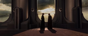 Movie still from “Star Wars: Episode III - Revenge of the Sith” (2005), directed by George Lucas – Two people standing next to each other in front of a window; Wide shot, High angle