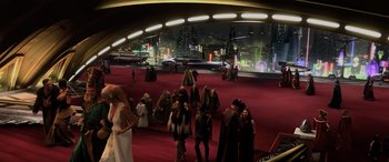 Movie still from “Star Wars: Episode III - Revenge of the Sith” (2005), directed by George Lucas – A group of people standing on top of a red carpet; Extreme Wide shot, High angle