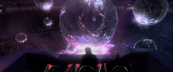 Movie still from “Star Wars: Episode III - Revenge of the Sith” (2005), directed by George Lucas – Two people sitting in front of a large glass ball; Extreme Wide shot, High angle