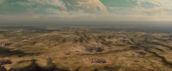 Movie still from “Star Wars: Episode III - Revenge of the Sith” (2005), directed by George Lucas – An aerial view of an alien landscape with two planets in the background; Extreme Wide shot, High angle