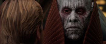 Movie still from “Star Wars: Episode III - Revenge of the Sith” (2005), directed by George Lucas – A person's face in a mask; Close Up shot, Over the shoulder angle