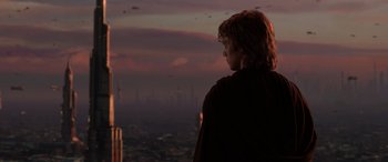 Movie still from “Star Wars: Episode III - Revenge of the Sith” (2005), directed by George Lucas – A man looking out over a city at sunset; Extreme Wide shot, Over the shoulder angle