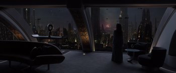 Movie still from “Star Wars: Episode III - Revenge of the Sith” (2005), directed by George Lucas – A woman standing in front of a window at night; Extreme Wide shot, High angle