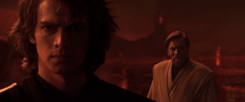 Movie still from “Star Wars: Episode III - Revenge of the Sith” (2005), directed by George Lucas – A man in a red robe and a woman in a white dress; Close Up shot, Over the shoulder angle
