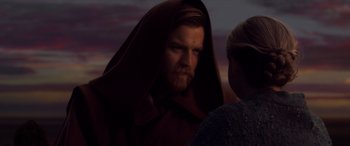 Movie still from “Star Wars: Episode III - Revenge of the Sith” (2005), directed by George Lucas – A man with a long beard and a brown robe; Close Up shot, Over the shoulder angle