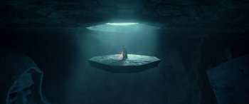 Movie still from “Star Wars: Episode IX - The Rise of Skywalker” (2019), directed by J.J. Abrams – An image of a person sitting on a platform in the middle of the ocean; Extreme Wide shot, Overhead angle