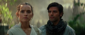 Movie still from “Star Wars: Episode IX - The Rise of Skywalker” (2019), directed by J.J. Abrams – A man and a woman standing next to each other; Close Up shot, Over the shoulder angle