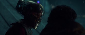 Movie still from “Star Wars: Episode IX - The Rise of Skywalker” (2019), directed by J.J. Abrams – A person wearing a helmet; Close Up shot, Over the shoulder angle