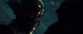 Movie still from “Star Wars: Episode IX - The Rise of Skywalker” (2019), directed by J.J. Abrams – A person wearing a helmet; Close Up shot, Over the shoulder angle