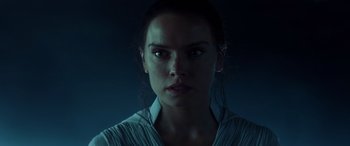 Movie still from “Star Wars: Episode IX - The Rise of Skywalker” (2019), directed by J.J. Abrams – A person wearing a white shirt; Close Up shot, Low angle
