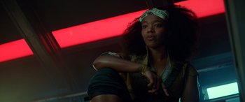 Movie still from “Star Wars: Episode IX - The Rise of Skywalker” (2019), directed by J.J. Abrams – A woman sitting on the ground in a room; Close Up shot, Low angle