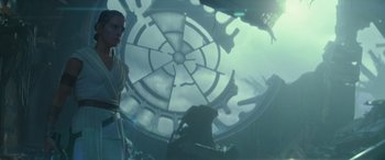 Movie still from “Star Wars: Episode IX - The Rise of Skywalker” (2019), directed by J.J. Abrams – A man standing in front of a clock tower; Medium shot, Low angle