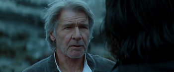 Movie still from “Star Wars: Episode IX - The Rise of Skywalker” (2019), directed by J.J. Abrams – A man with long gray hair and a white beard; Close Up shot, Over the shoulder angle