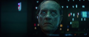 Movie still from “Star Wars: Episode IX - The Rise of Skywalker” (2019), directed by J.J. Abrams – An older man with blue eyes stares out a window; Close Up shot, Low angle
