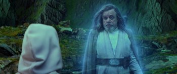 Movie still from “Star Wars: Episode IX - The Rise of Skywalker” (2019), directed by J.J. Abrams – A man with long white hair and a beard is standing in front of another man with long white hair; Medium shot, Over the shoulder angle