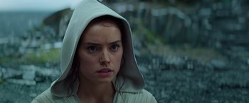 Movie still from “Star Wars: Episode IX - The Rise of Skywalker” (2019), directed by J.J. Abrams – A person with a hood on; Close Up shot, Over the shoulder angle
