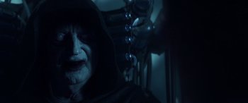 Movie still from “Star Wars: Episode IX - The Rise of Skywalker” (2019), directed by J.J. Abrams – An old man in a hooded jacket and a helmet; Close Up shot, Over the shoulder angle
