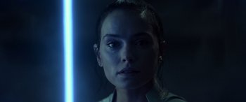 Movie still from “Star Wars: Episode IX - The Rise of Skywalker” (2019), directed by J.J. Abrams – A person wearing a white shirt; Close Up shot, Over the shoulder angle