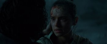 Movie still from “Star Wars: Episode IX - The Rise of Skywalker” (2019), directed by J.J. Abrams – A person with a head wound; Close Up shot, Over the shoulder angle