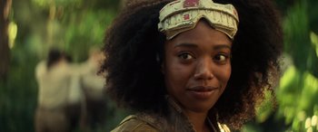 Movie still from “Star Wars: Episode IX - The Rise of Skywalker” (2019), directed by J.J. Abrams – A person wearing a paper crown; Close Up shot, Over the shoulder angle