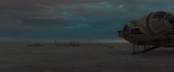 Movie still from “Star Wars: Episode IX - The Rise of Skywalker” (2019), directed by J.J. Abrams – A group of people standing on top of a sandy beach; Extreme Wide shot, Low angle