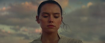 Movie still from “Star Wars: Episode IX - The Rise of Skywalker” (2019), directed by J.J. Abrams – A person with her eyes closed; Close Up shot, Low angle