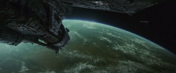 Movie still from “Star Wars: Episode VIII - The Last Jedi” (2017), directed by Rian Johnson – An image of an earth from space taken from a space station; Extreme Wide shot, Overhead angle