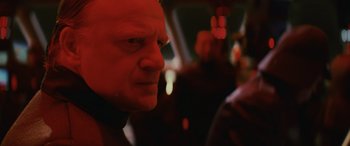 Movie still from “Star Wars: Episode VIII - The Last Jedi” (2017), directed by Rian Johnson – A person in a car at night; Close Up shot, Over the shoulder angle