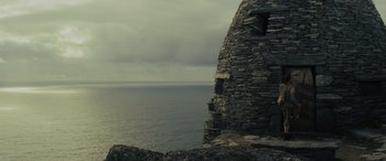 Movie still from “Star Wars: Episode VIII - The Last Jedi” (2017), directed by Rian Johnson – A view of the ocean from the top of an old castle; Extreme Wide shot, Low angle