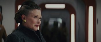 Movie still from “Star Wars: Episode VIII - The Last Jedi” (2017), directed by Rian Johnson – A person wearing a jacket; Close Up shot, Over the shoulder angle
