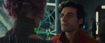 Movie still from “Star Wars: Episode VIII - The Last Jedi” (2017), directed by Rian Johnson – A person looking at a woman; Close Up shot, Over the shoulder angle