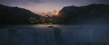 Movie still from “Star Wars: Episode VIII - The Last Jedi” (2017), directed by Rian Johnson – A view of a city at sunset from a boat; Extreme Wide shot, Low angle