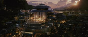 Movie still from “Star Wars: Episode VIII - The Last Jedi” (2017), directed by Rian Johnson – An aerial view of a city at night with lights on; Extreme Wide shot, High angle