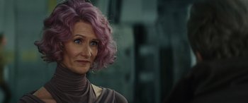 Movie still from “Star Wars: Episode VIII - The Last Jedi” (2017), directed by Rian Johnson – A person with purple hair; Close Up shot, Over the shoulder angle