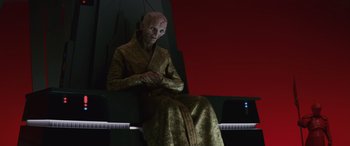 Movie still from “Star Wars: Episode VIII - The Last Jedi” (2017), directed by Rian Johnson – A person sitting on top of a piano; Medium shot, Over the shoulder angle